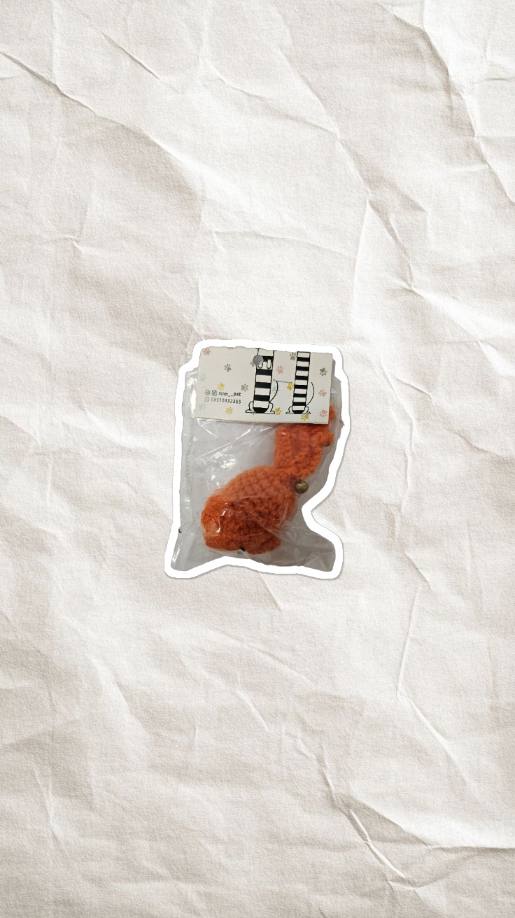 اسباب بازی بافتنی زنگوله دار ماهی نارنجی