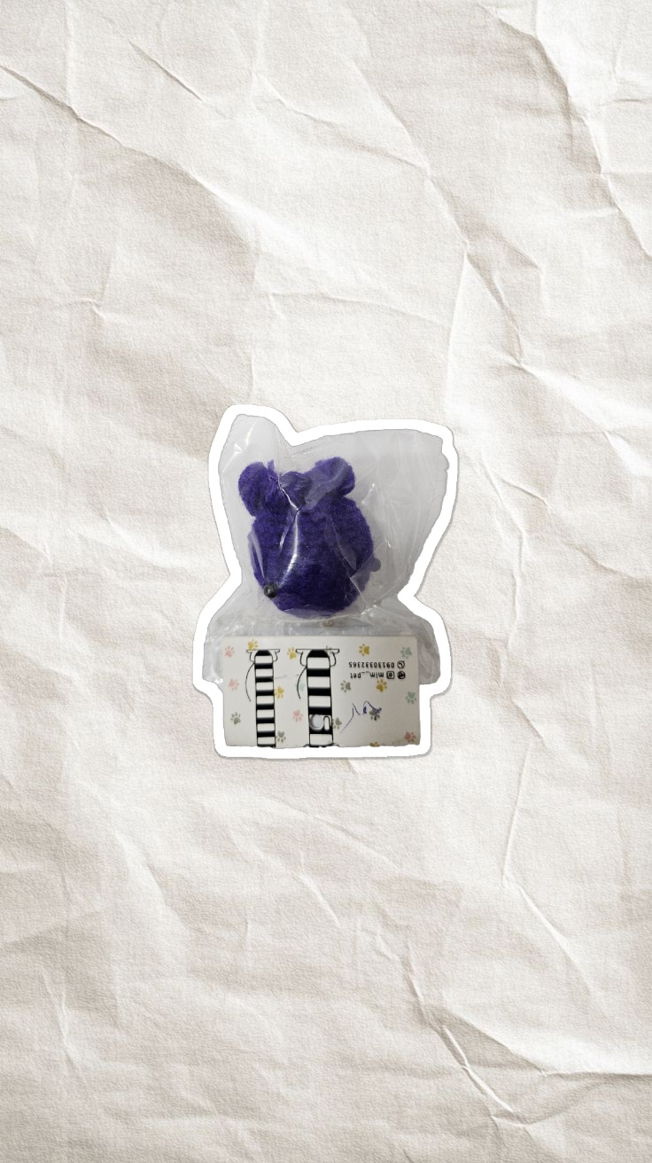 اسباب بازی بافتنی زنگوله دار ماهی گرد بنفش