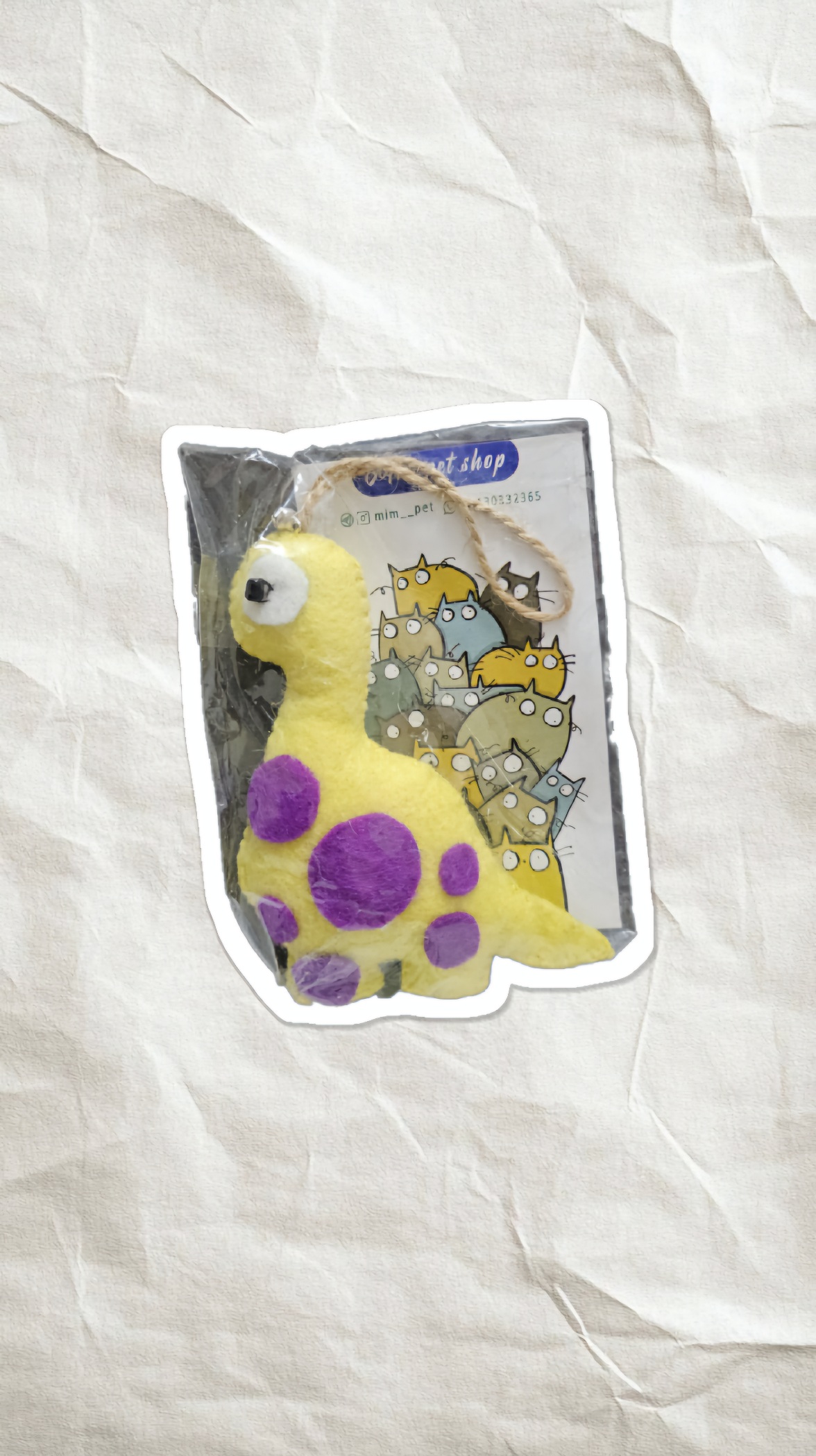 اسباب بازی نمدی بند دار دایناسور زرد