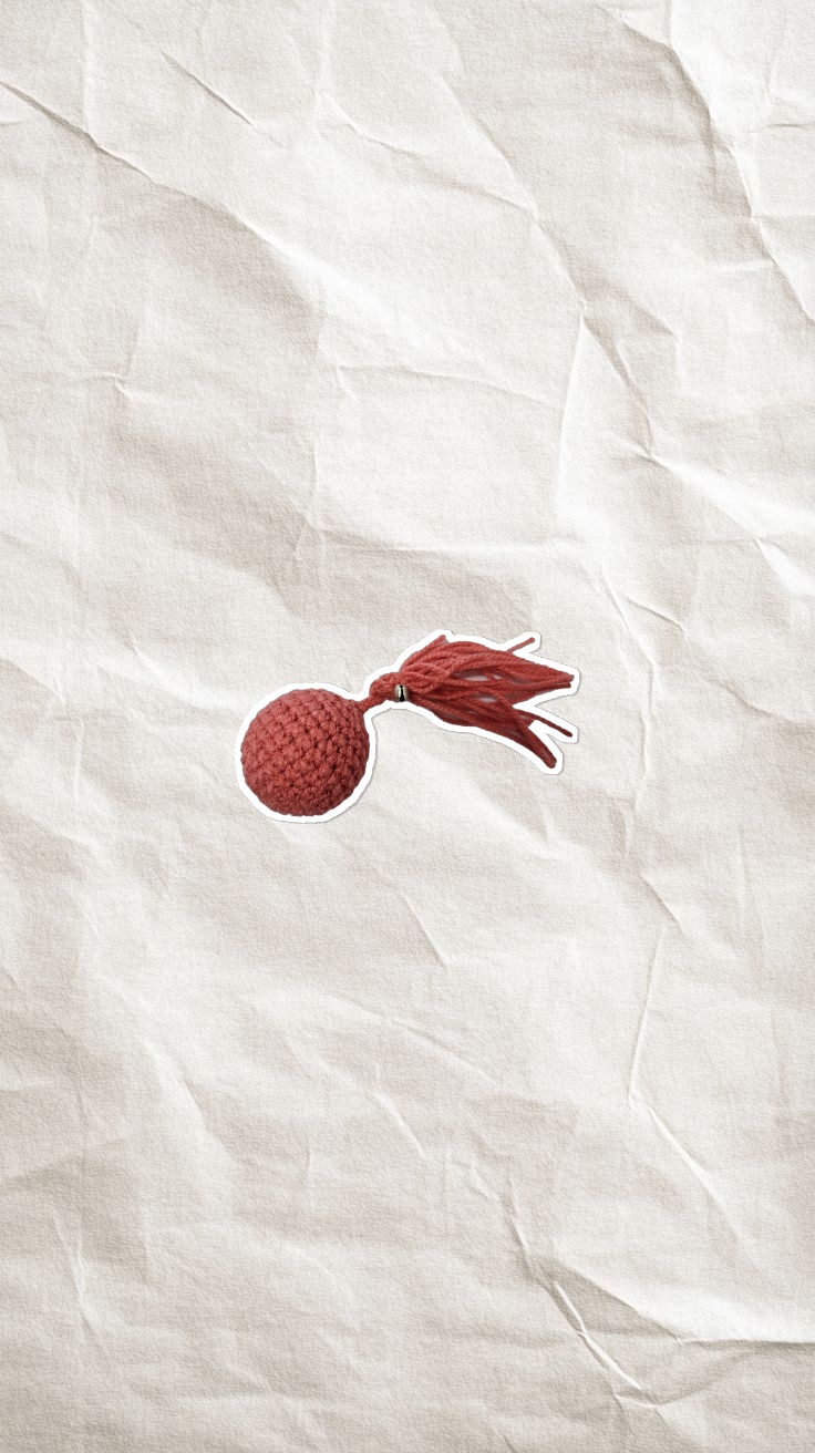 اسباب بازی بافتنی زنگوله دار توپ دنباله دار